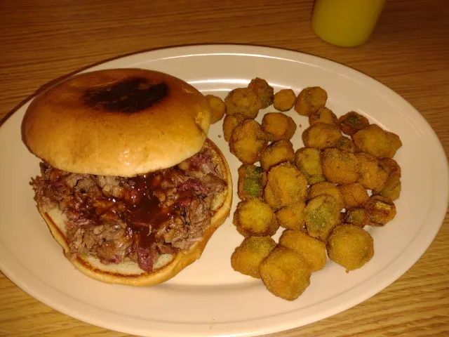 Pulled Brisket BBQ Sandwich with Fried Okra Name of Restaurant Is Como Burgers and Fries